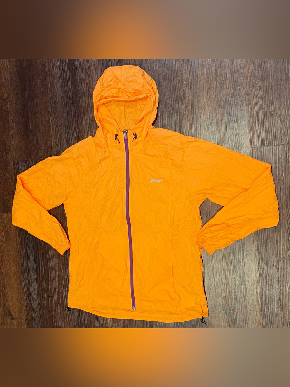 Woman packable running jacket